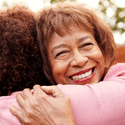 women hug