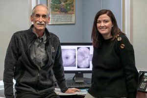 Team members of the Atlas of Retinal Imaging in Alzheimer’s Study (ARIAS) Stephen Salloway, M.D., director of Neurology and the Memory and Aging Program, Butler Hospital and Martin M. Zucker professor of psychiatry and human behavior, professor of neurology, Alpert Medical School of Brown University, and Jessica Alber, Ph.D., Ryan research assistant professor of neuroscience at URI. Photo: Michael Salerno/URI 