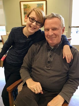 Katie continues to be a caregiver to her dad (shown here with Katie's son, Noah) while he lives in a memory care assisted living program.