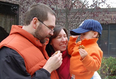Katie's son Noah says that this is his favorite family picture (taken when he was just 2 1/2) because he and his dad are both wearing their favorite color, orange.